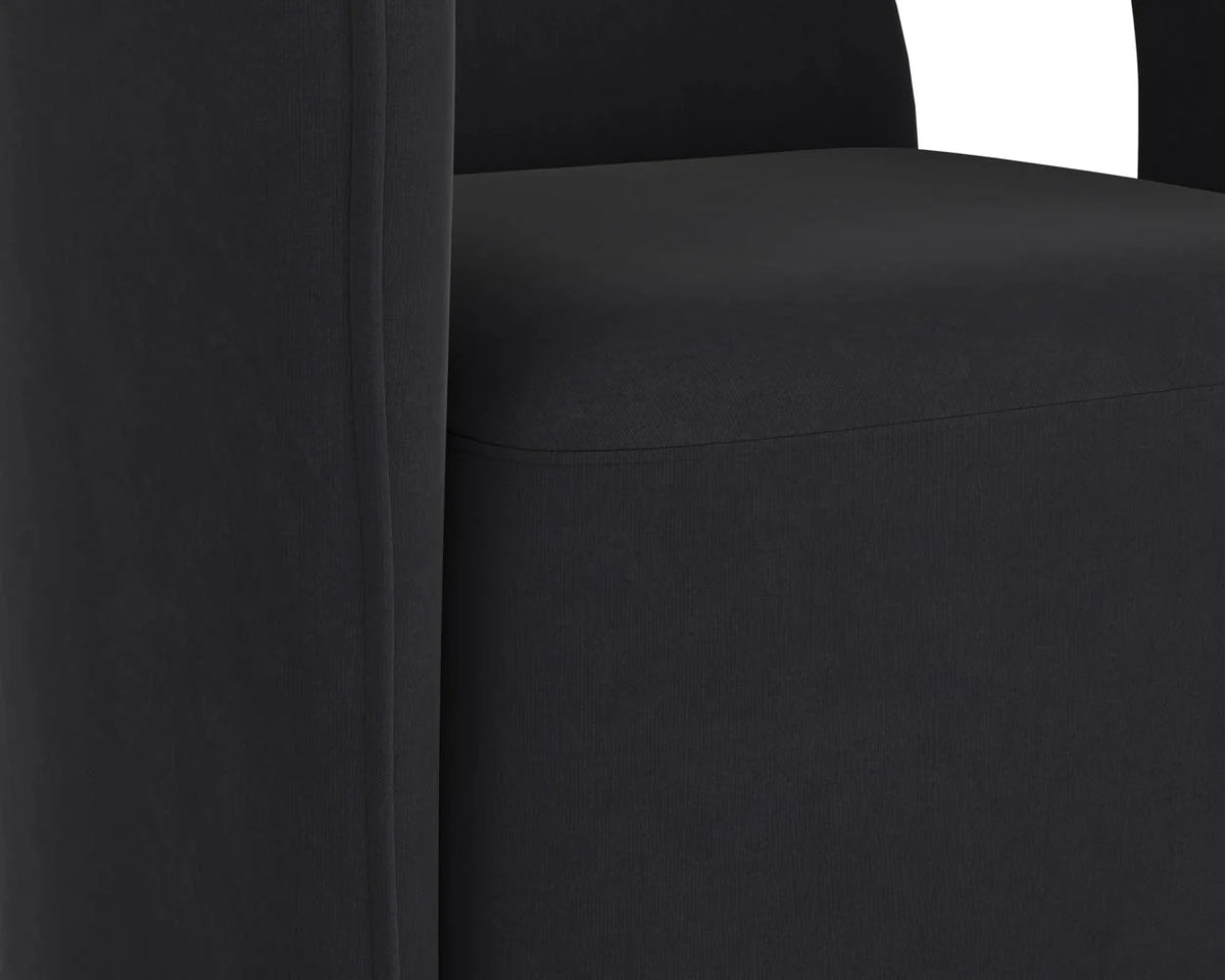 Kendrick Black Upholstered Wheeled Dining Armchair