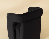 Kendrick Black Upholstered Wheeled Dining Armchair