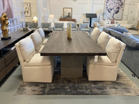 Damaris Modern Beige Dining Chair With Castor Wheels