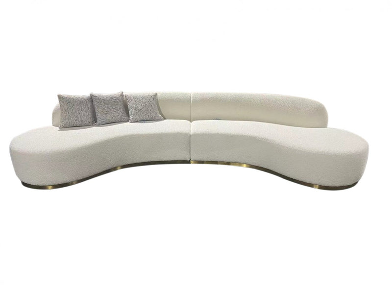 Giovanni Curved White Sectional Sofa With Beige Pillows